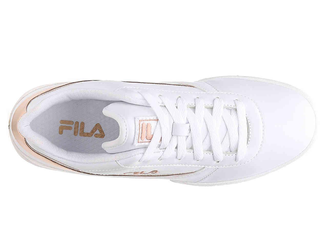 gold and white filas