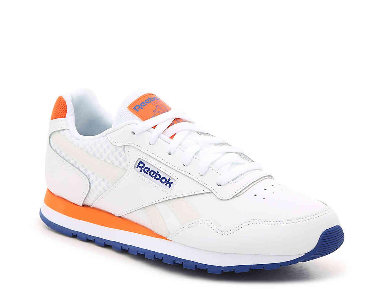 orange and blue reebok classics
