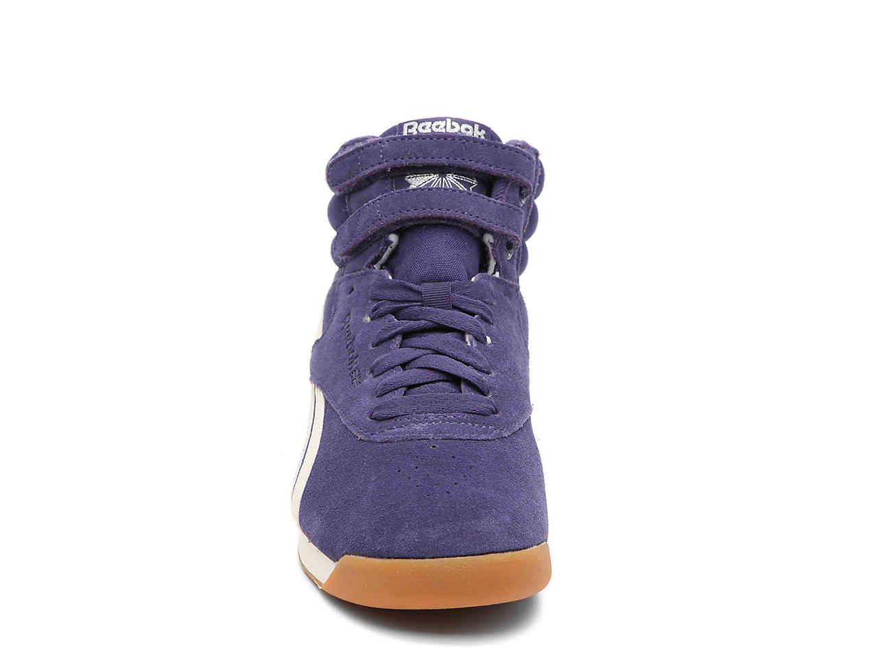 purple reebok high tops