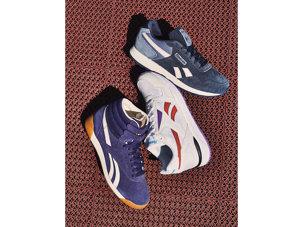 purple reebok high tops
