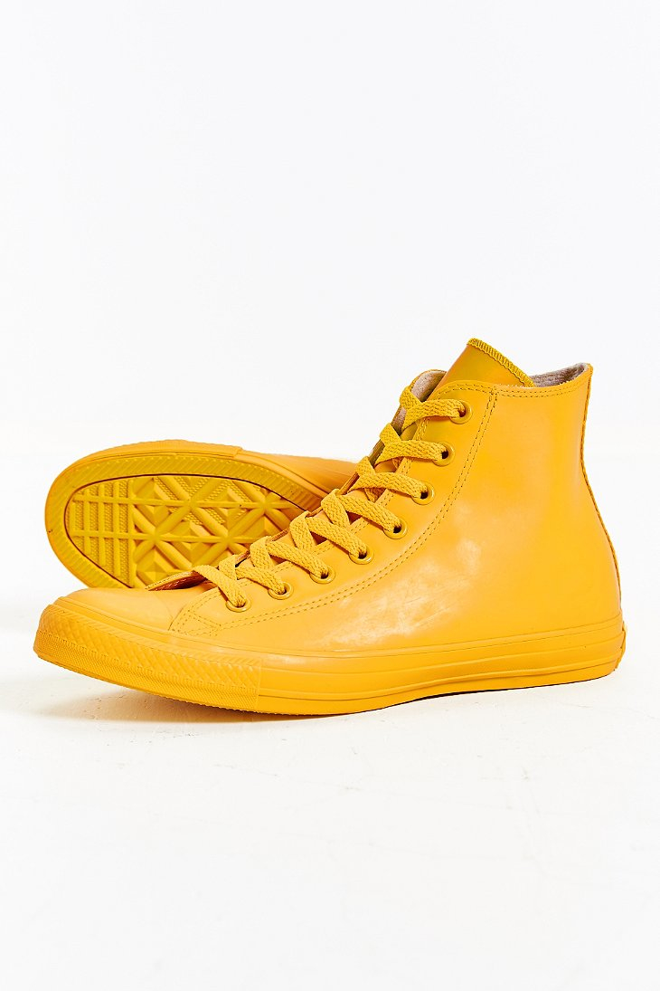 yellow rubber converse high tops