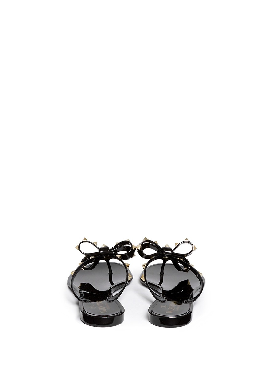 Valentino 'rockstud' Bow Flat Jelly Sandals in Black - Lyst