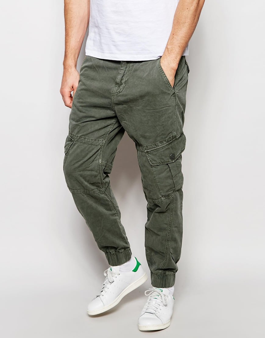 True Religion Cotton Slim Tapered Cargo Trousers With Pocket Detailing ...