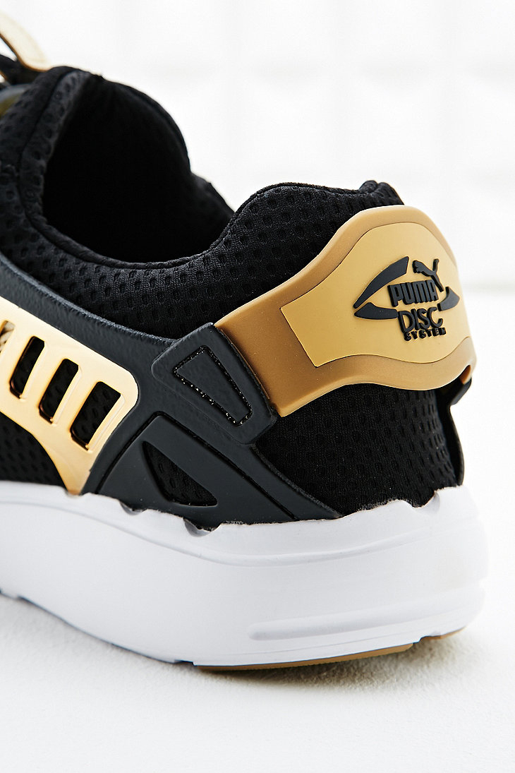 puma disc blaze black gold