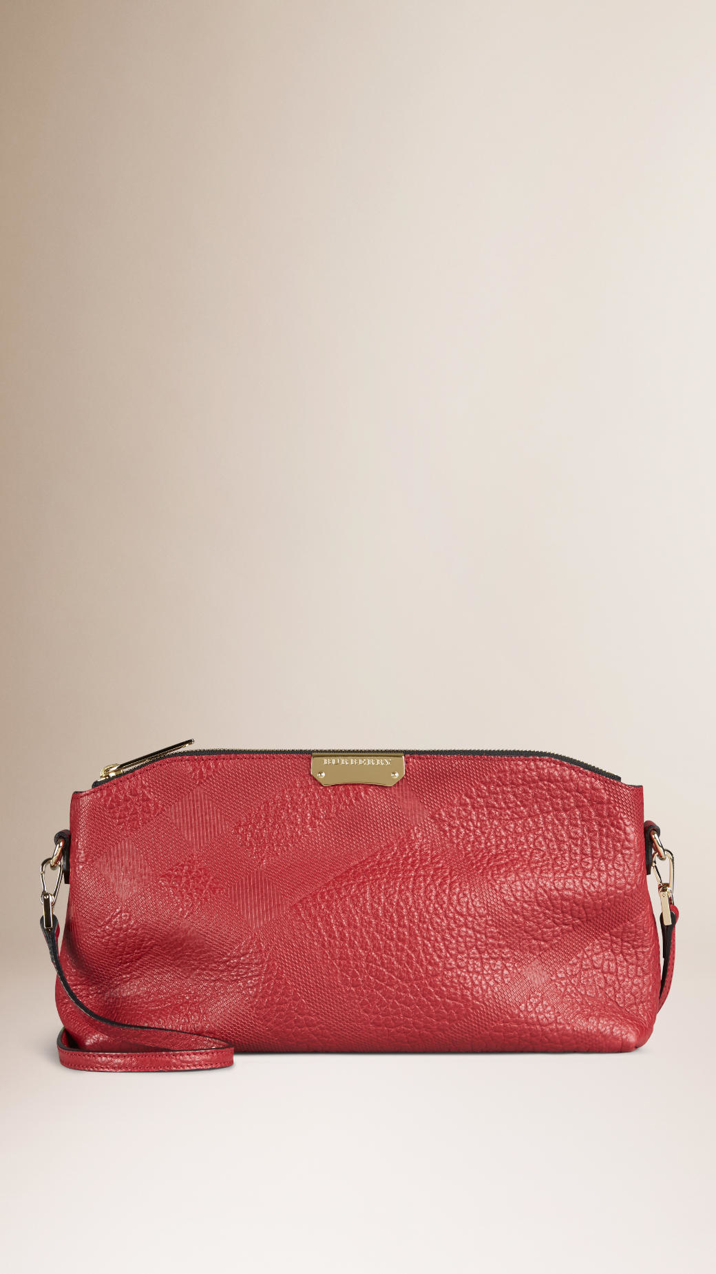 Lyst - Burberry Small Embossed Check Leather Clutch Bag in Red