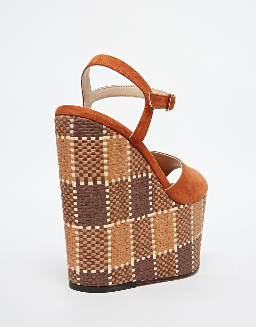 brown high wedges