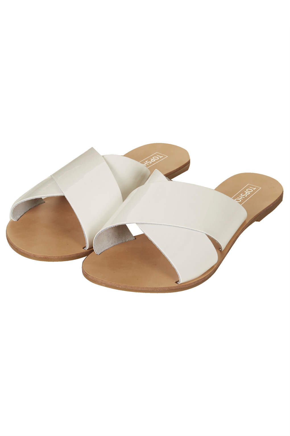 white cross sandals