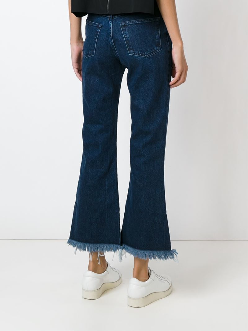 raw edge flare jeans