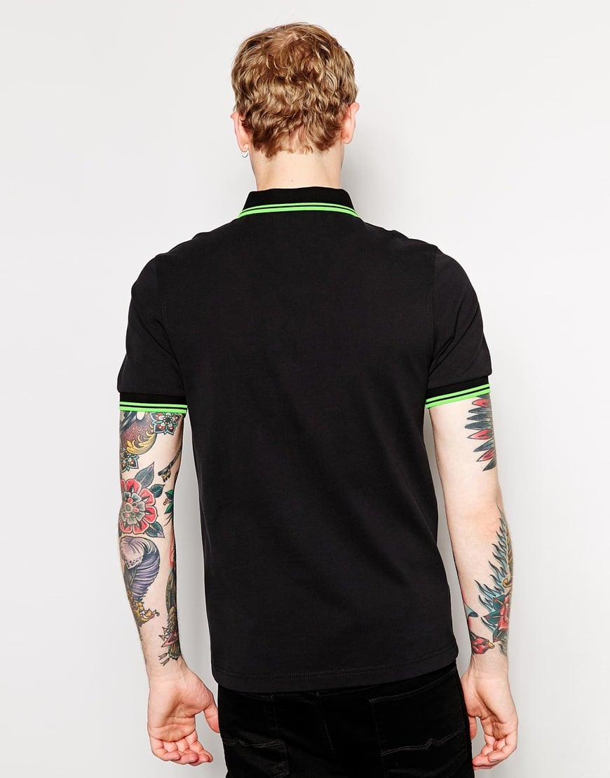 black and neon green polo shirt