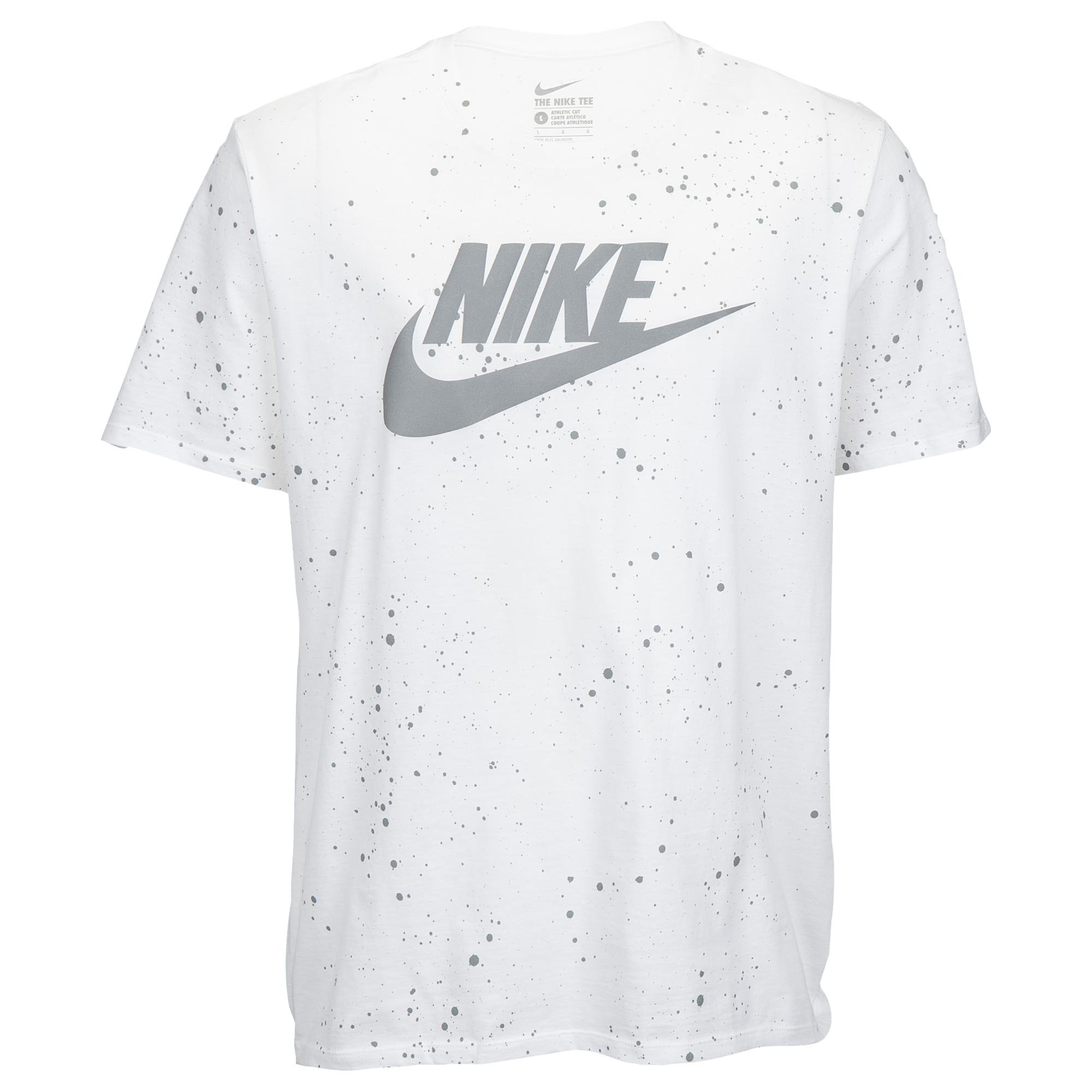 white and gray nike shirt