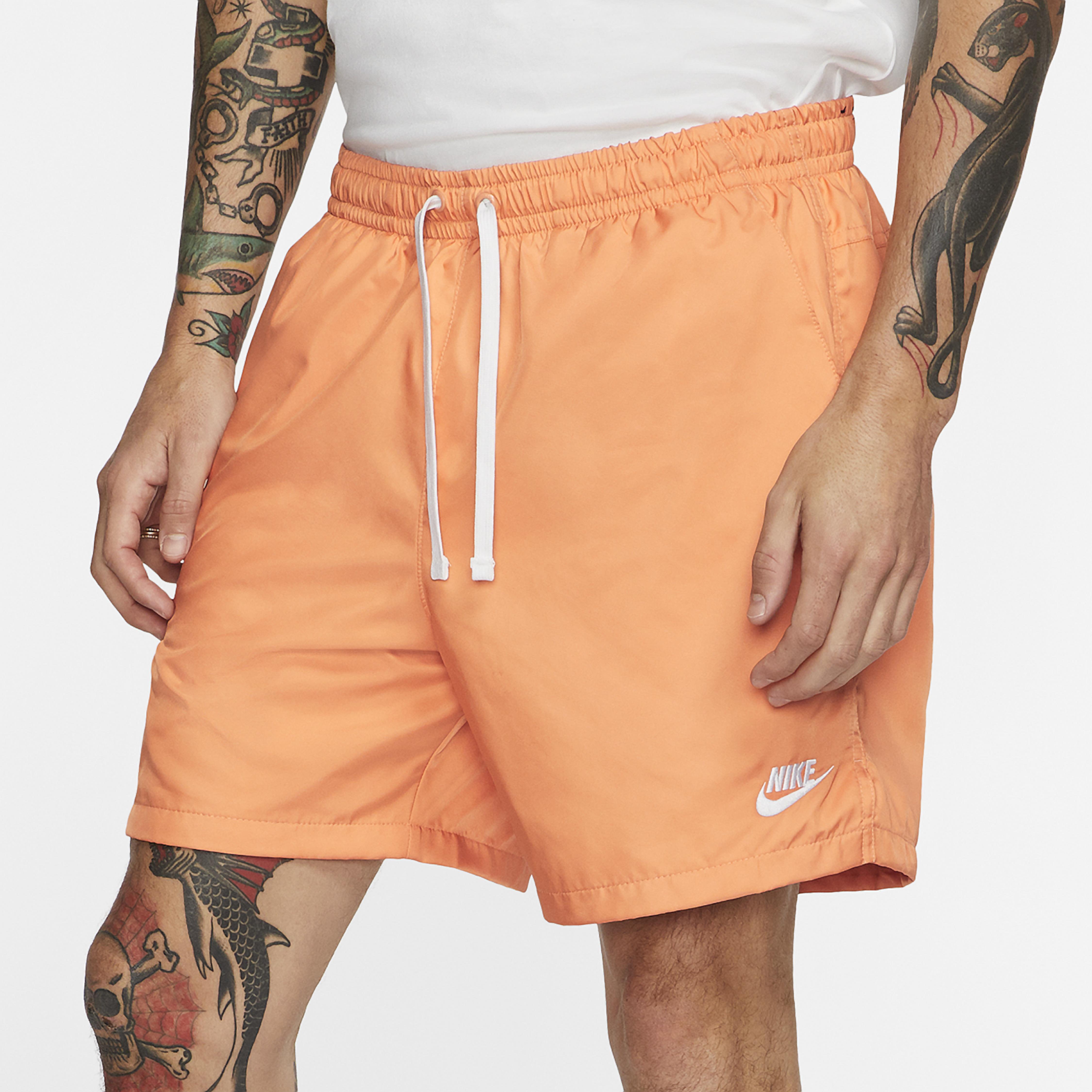 nike orange woven shorts