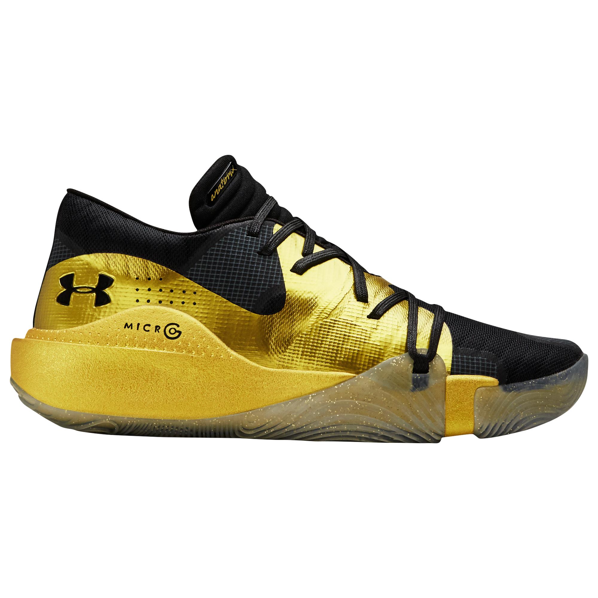 under armour gold and black shoes