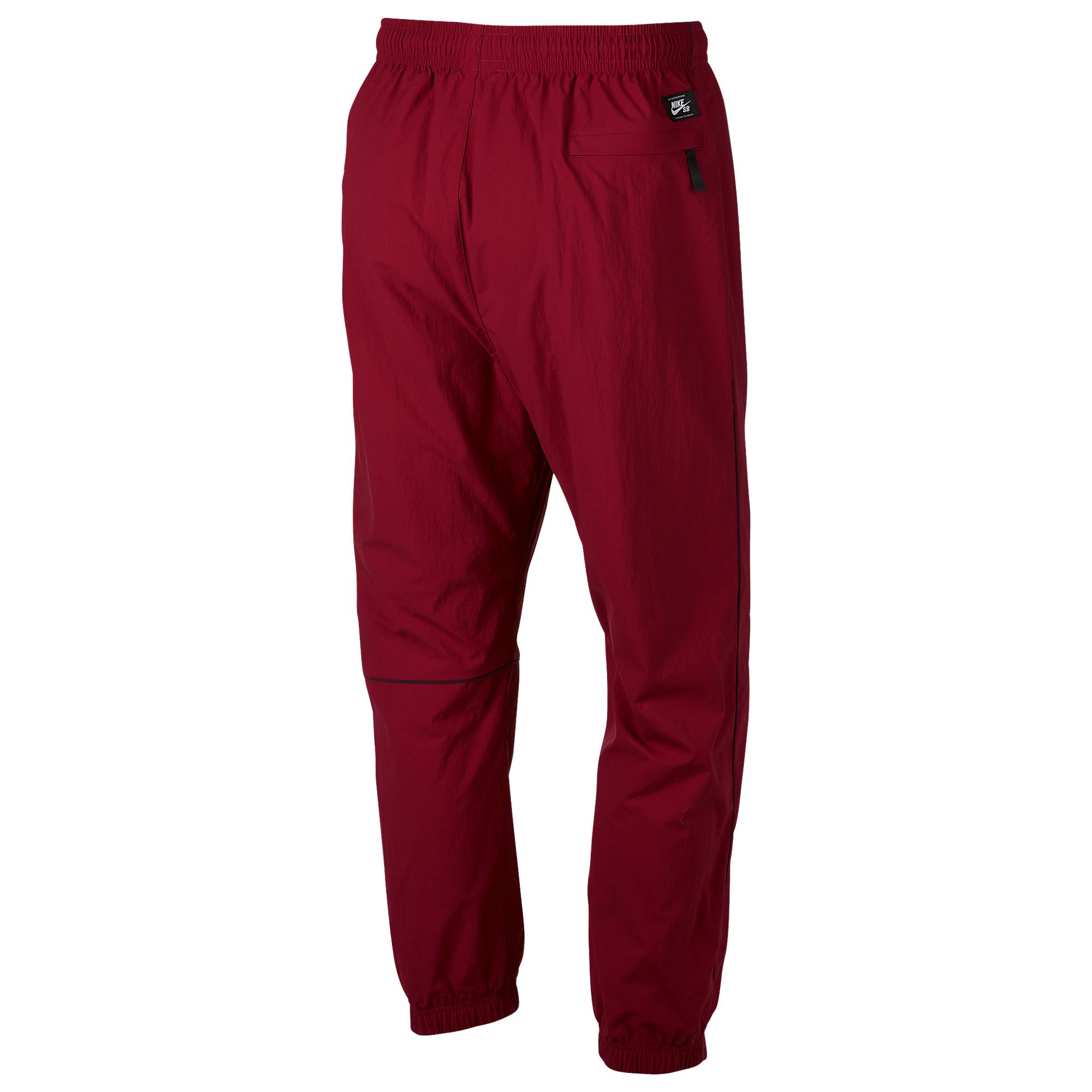 nike wind pants with zipper at ankle