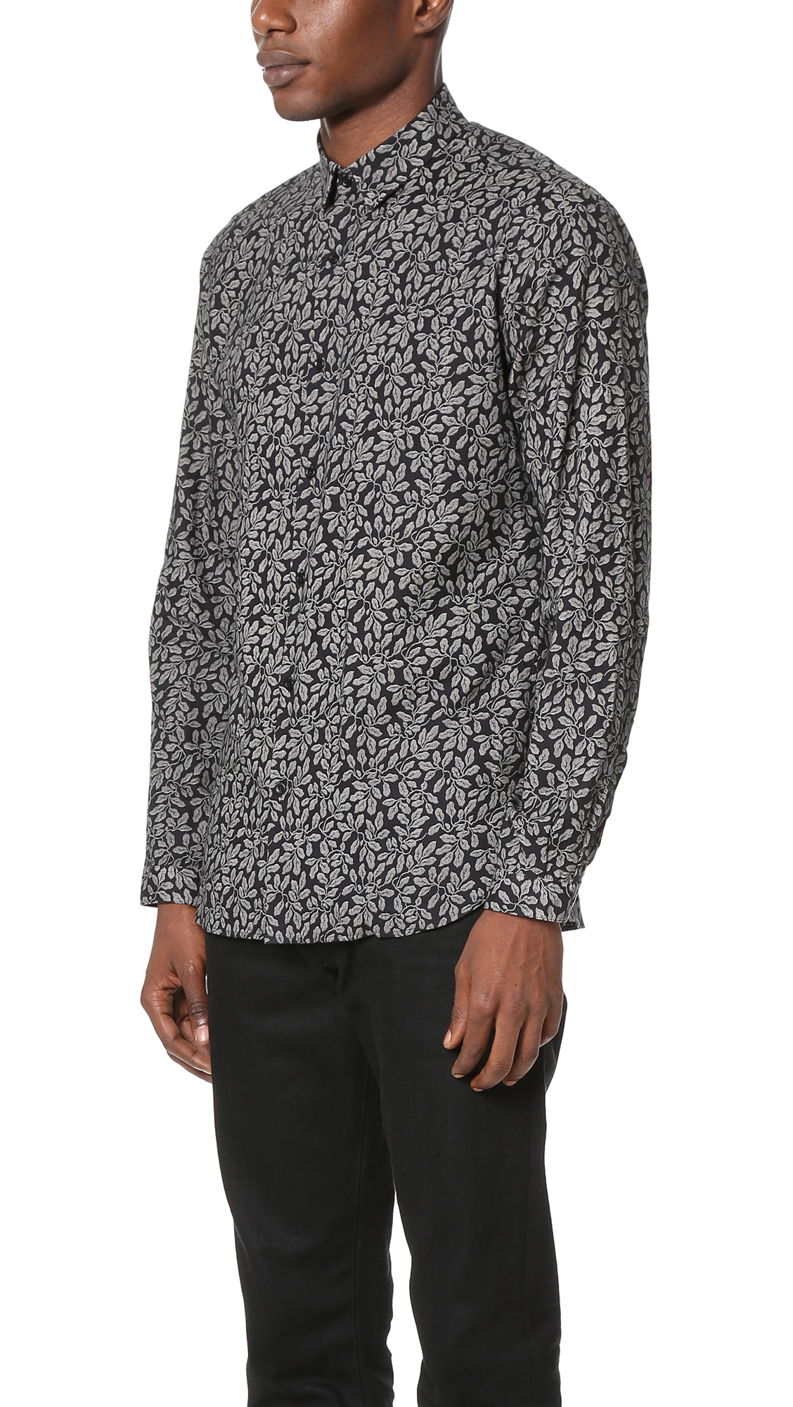 white and black printed shirt