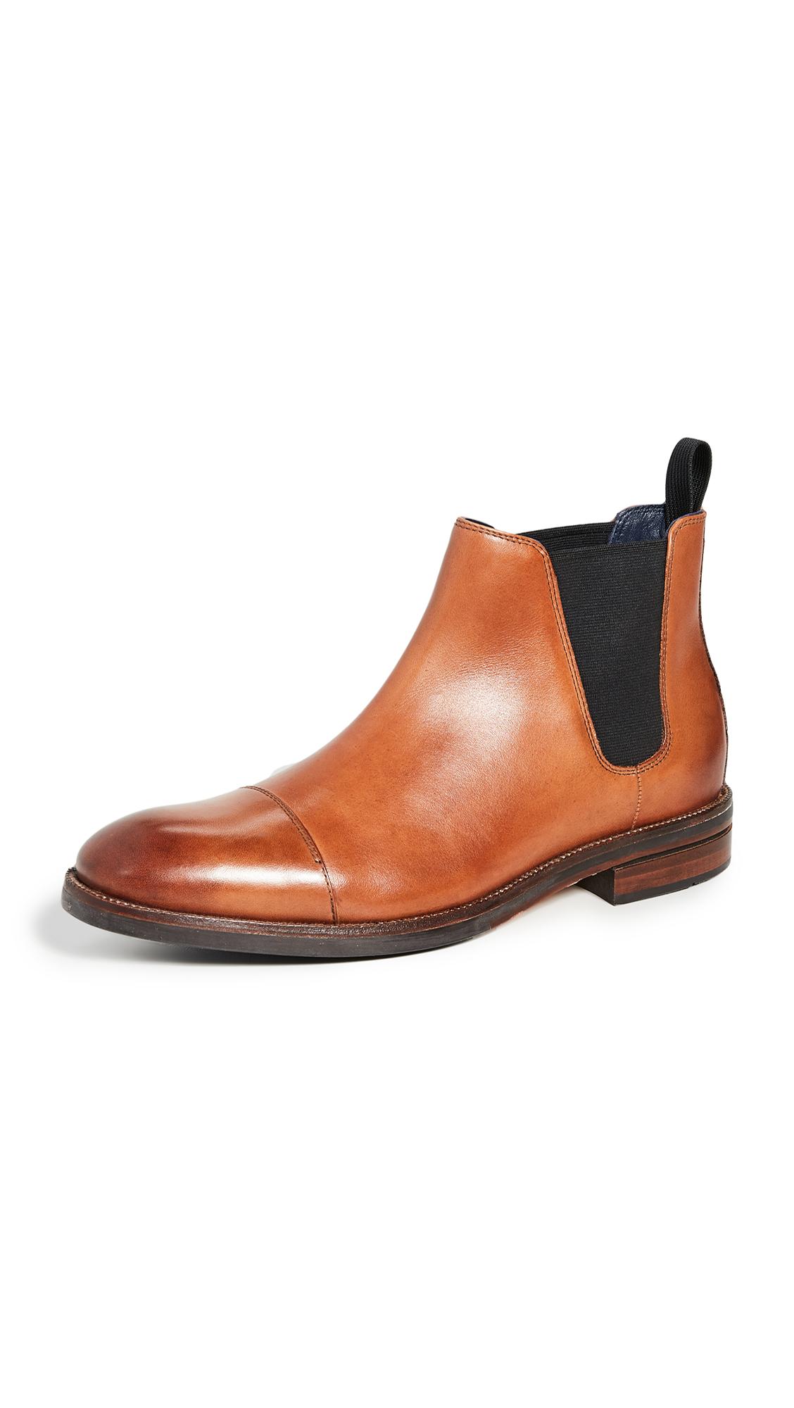 cole haan men's wagner grand plain toe boot waterproof fashion