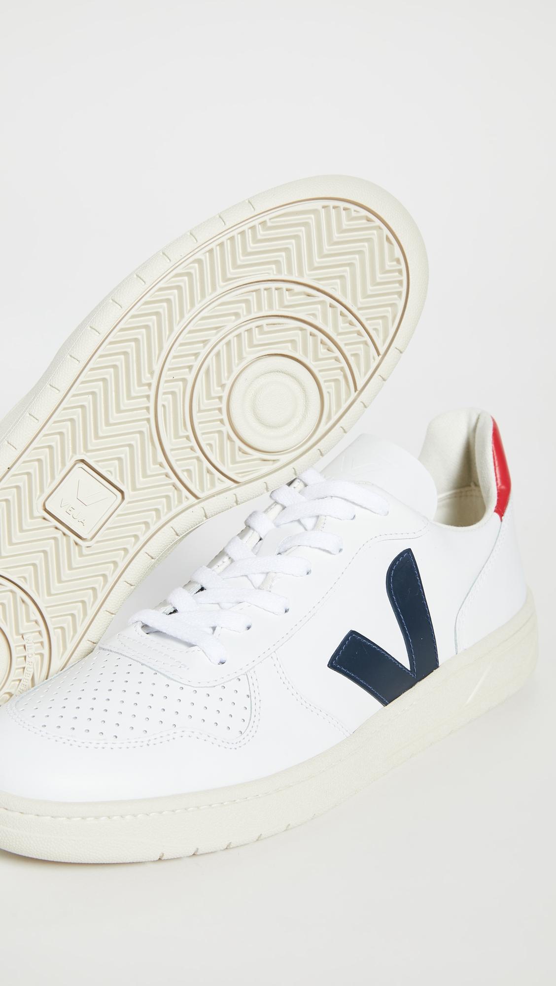 white sneakers with v