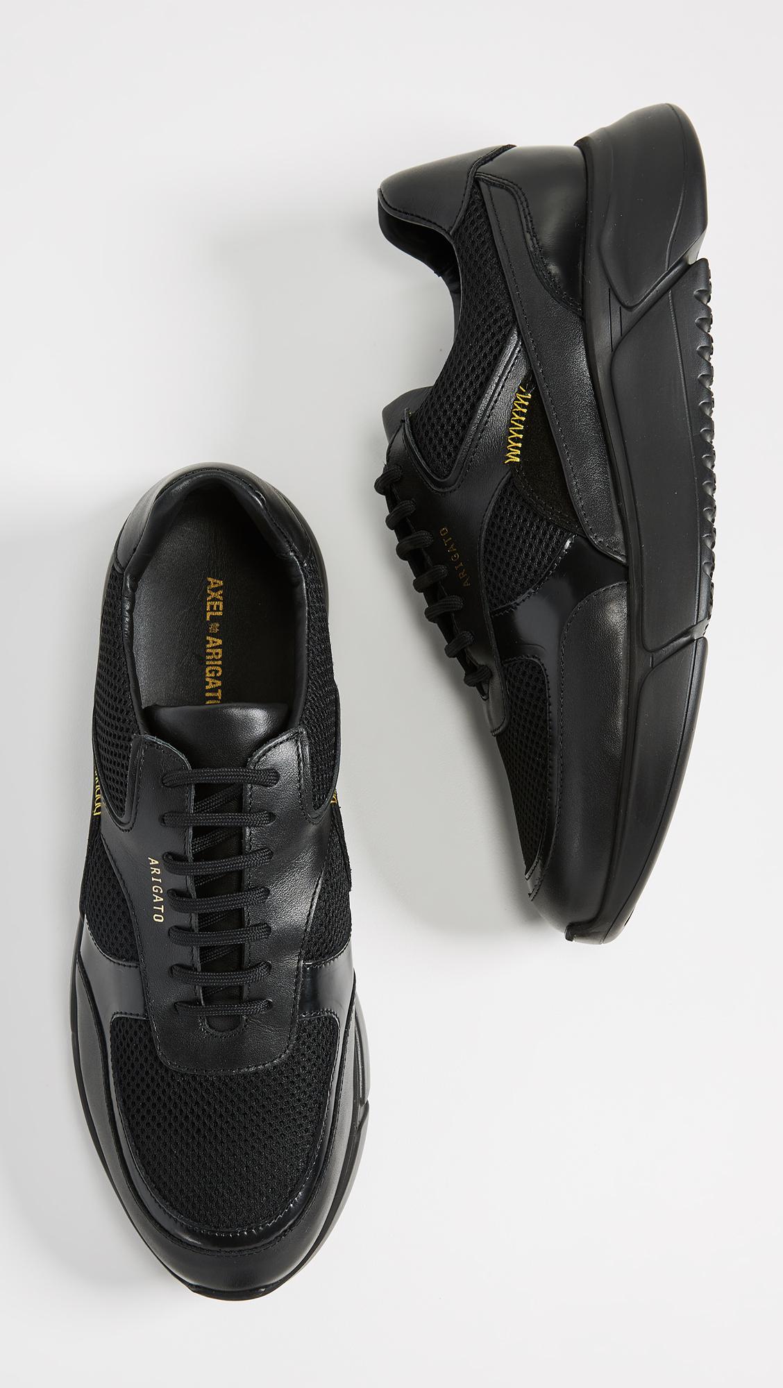 axel arigato genesis black