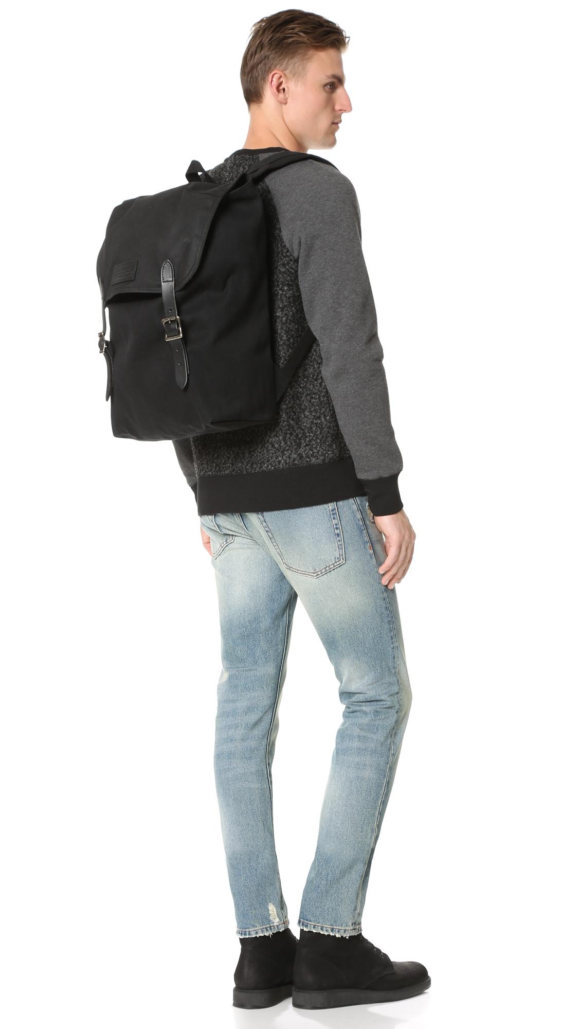 filson black backpack