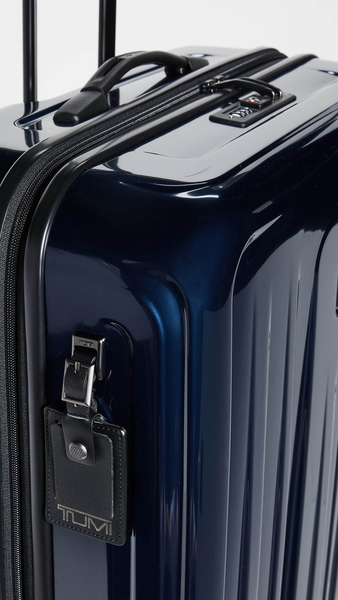tumi v4 extended trip luggage