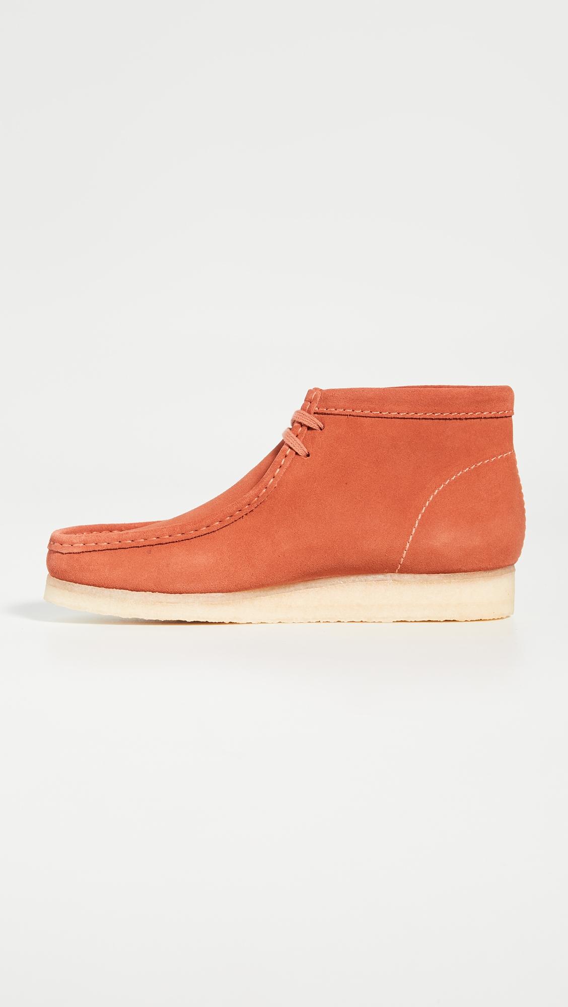 orange clark wallabees
