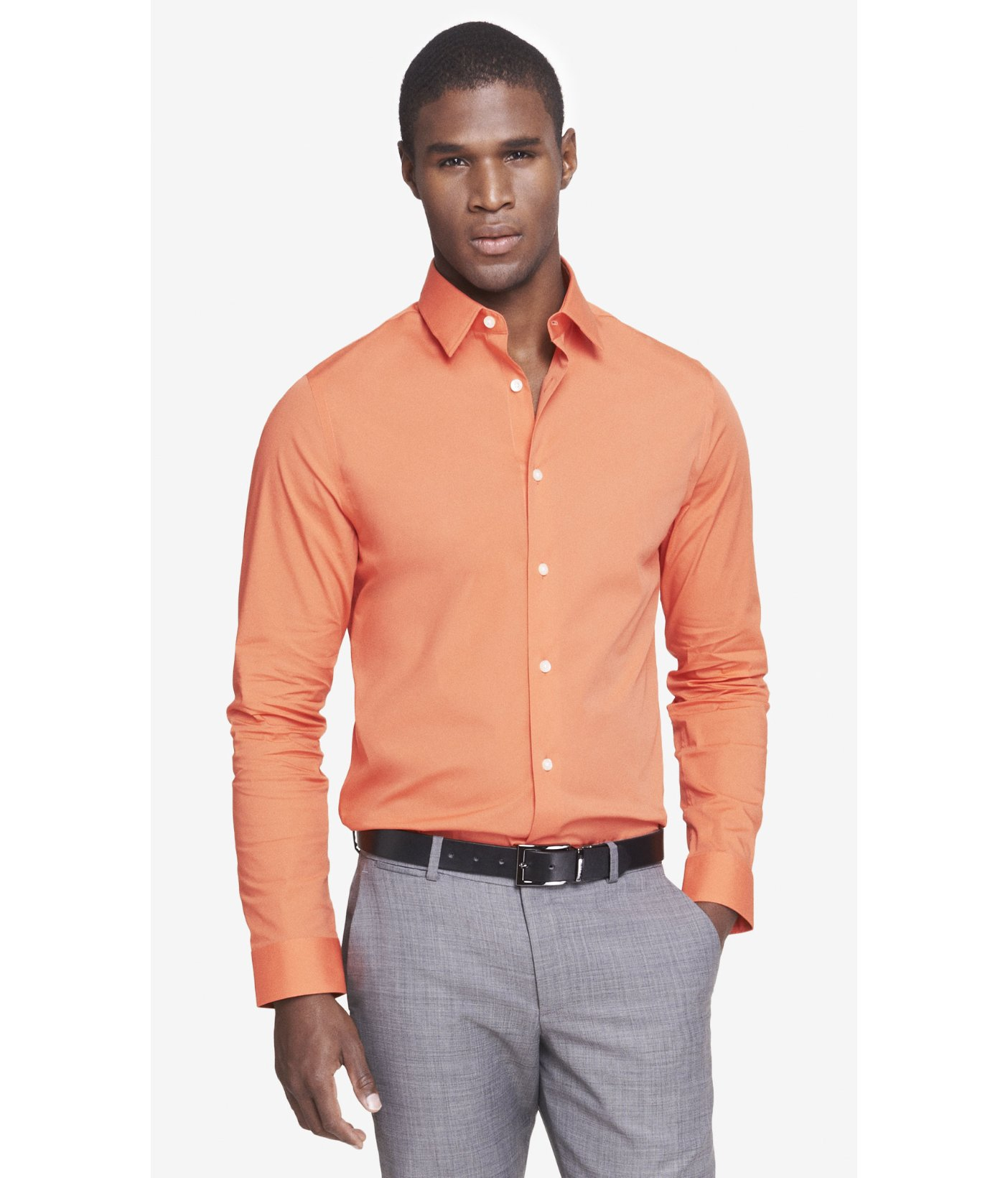 orange shirt grey pants