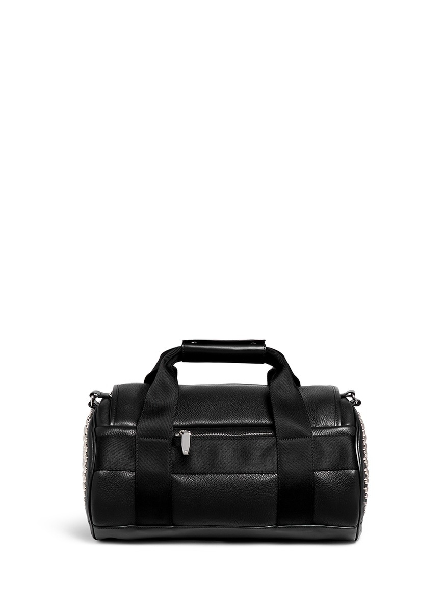 small leather duffle bag