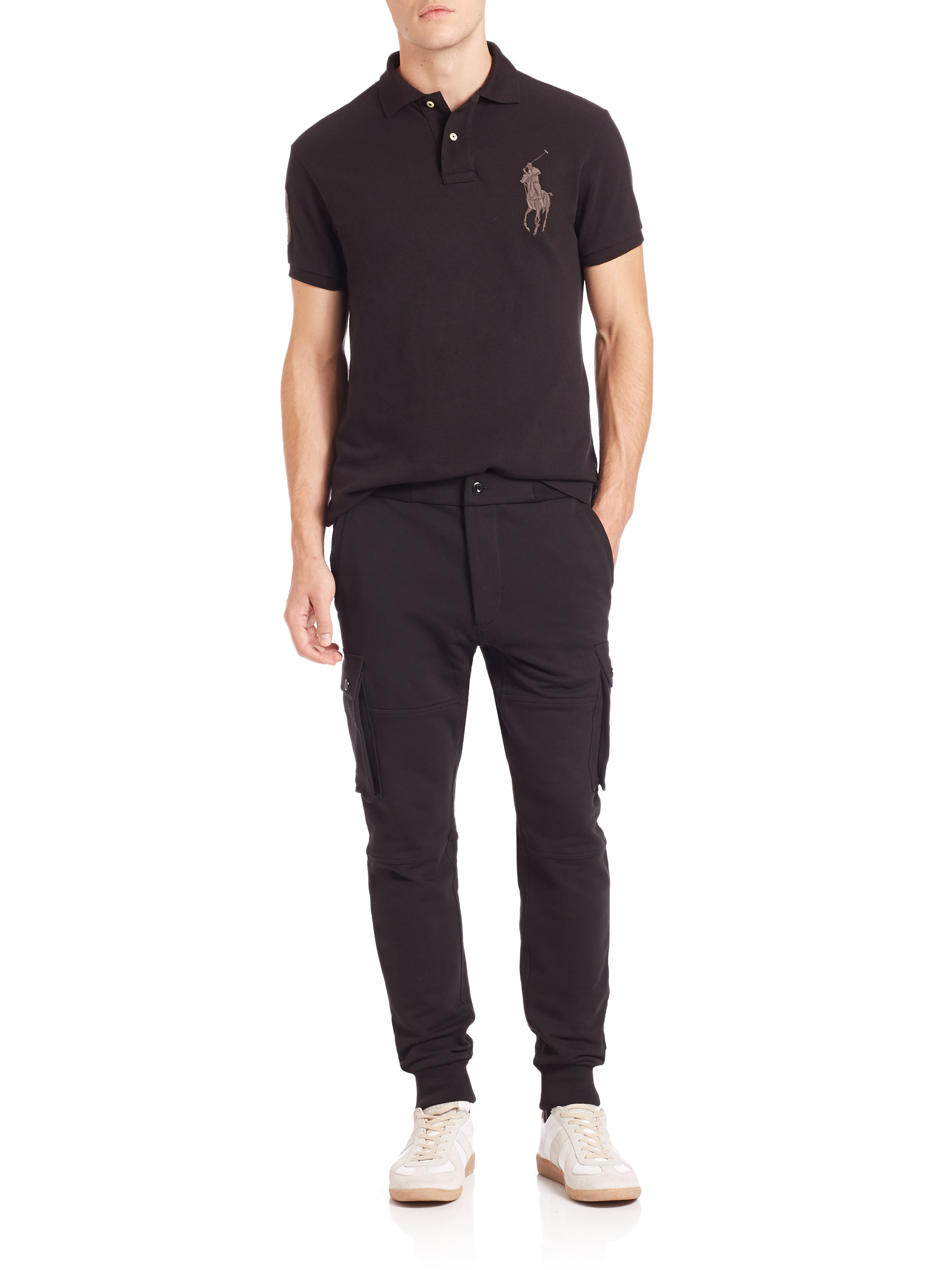 black pants and polo shirt