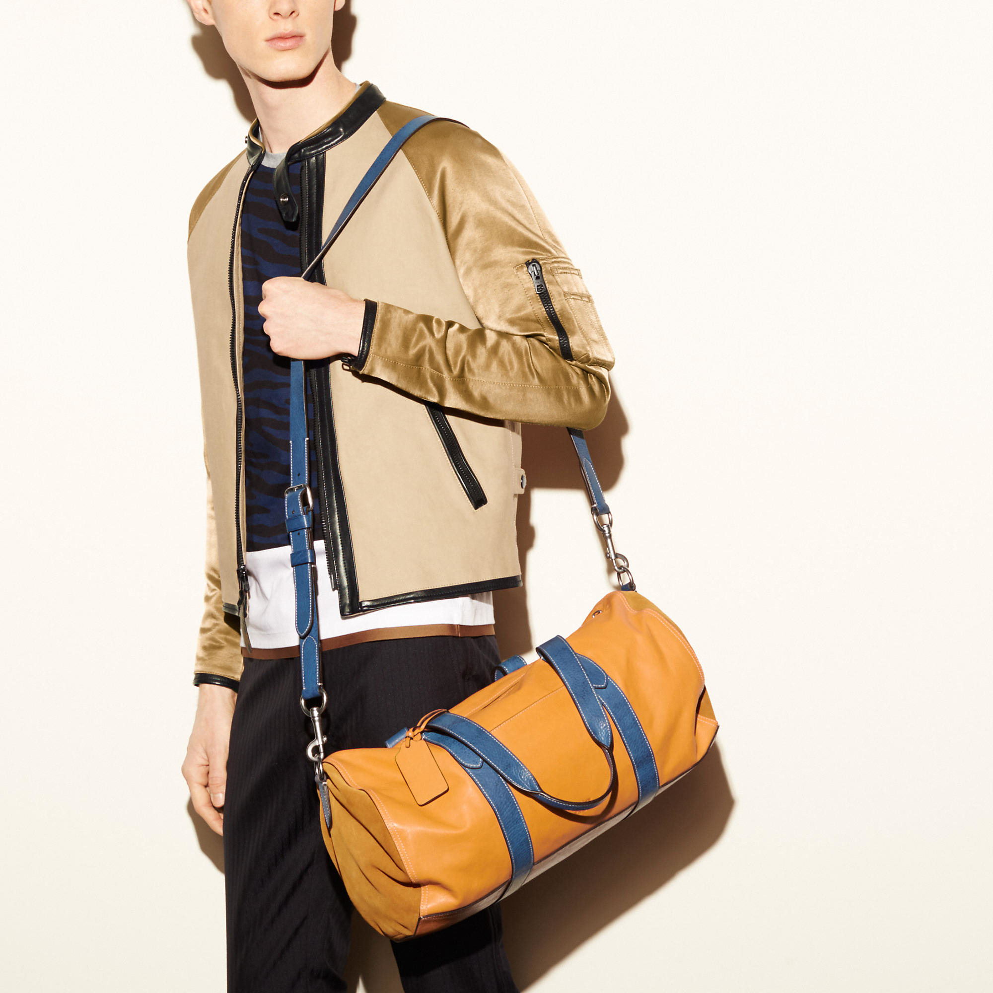 Download COACH Large Gym Bag In Sport Calf Leather in Amber/Marine ...
