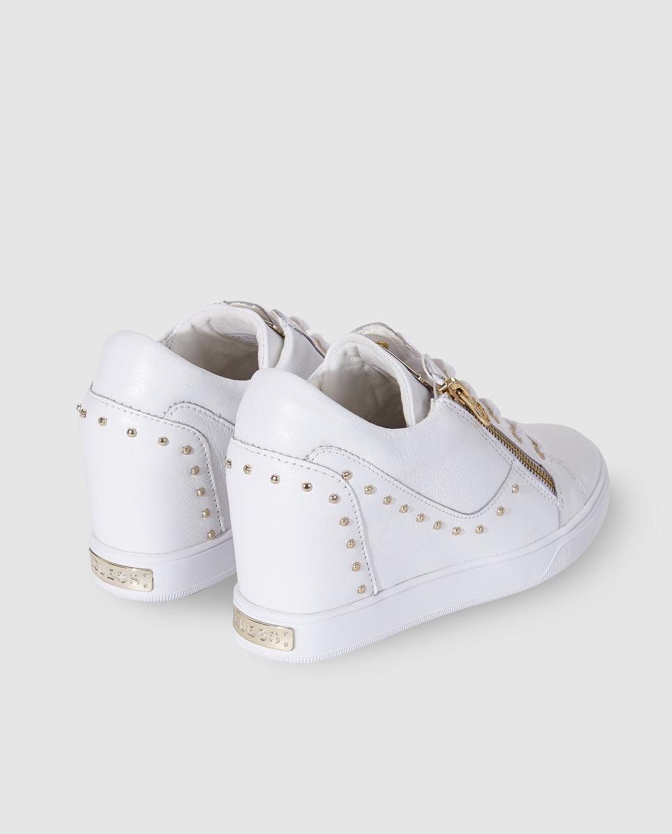 guess white wedge trainers