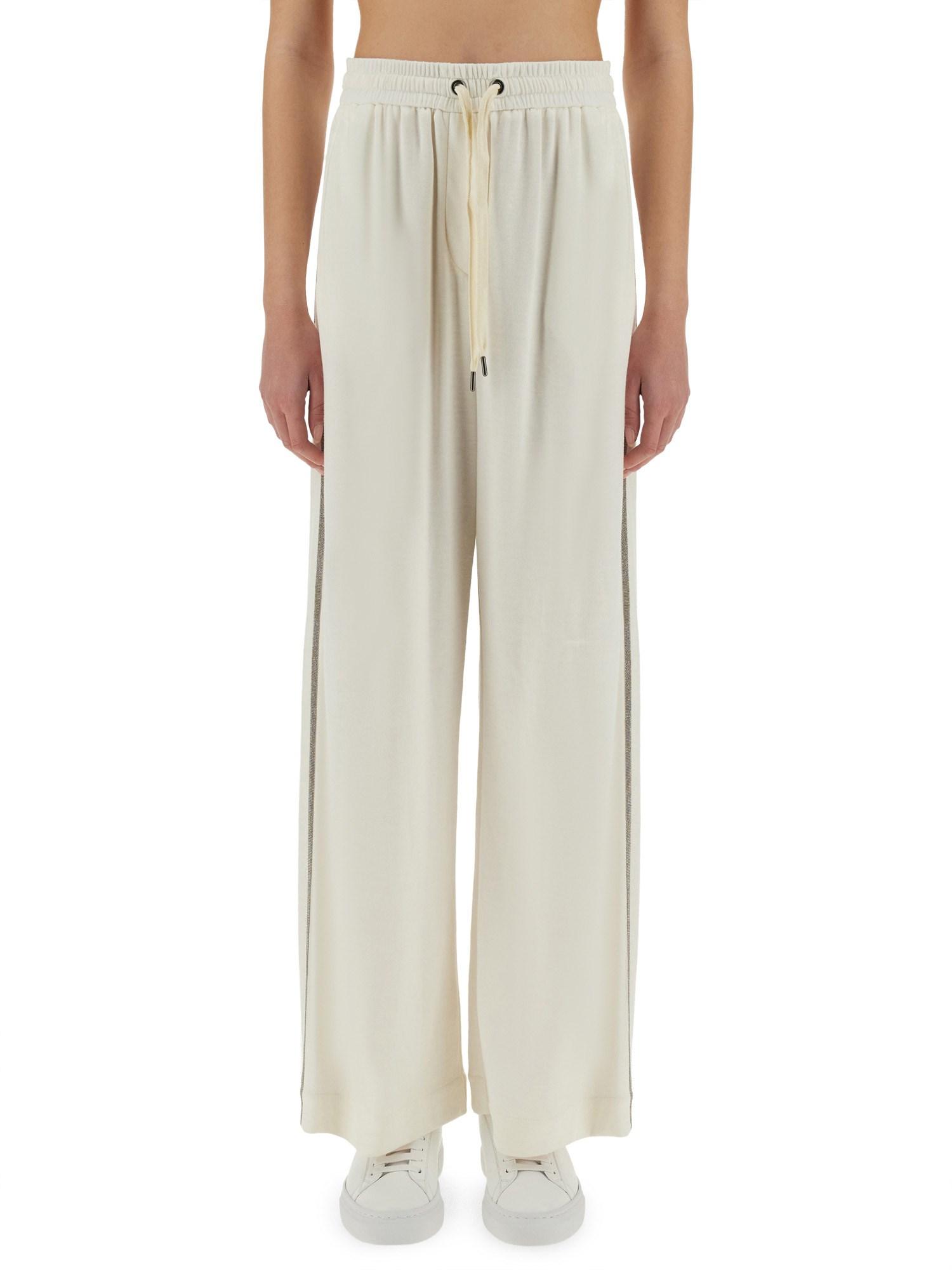 パンツ BRUNELLO CUCINELLI TRACK PANTS WITH NECKLACE Brunello Cucinelli Track Pants With Necklace in Natural | Lyst
