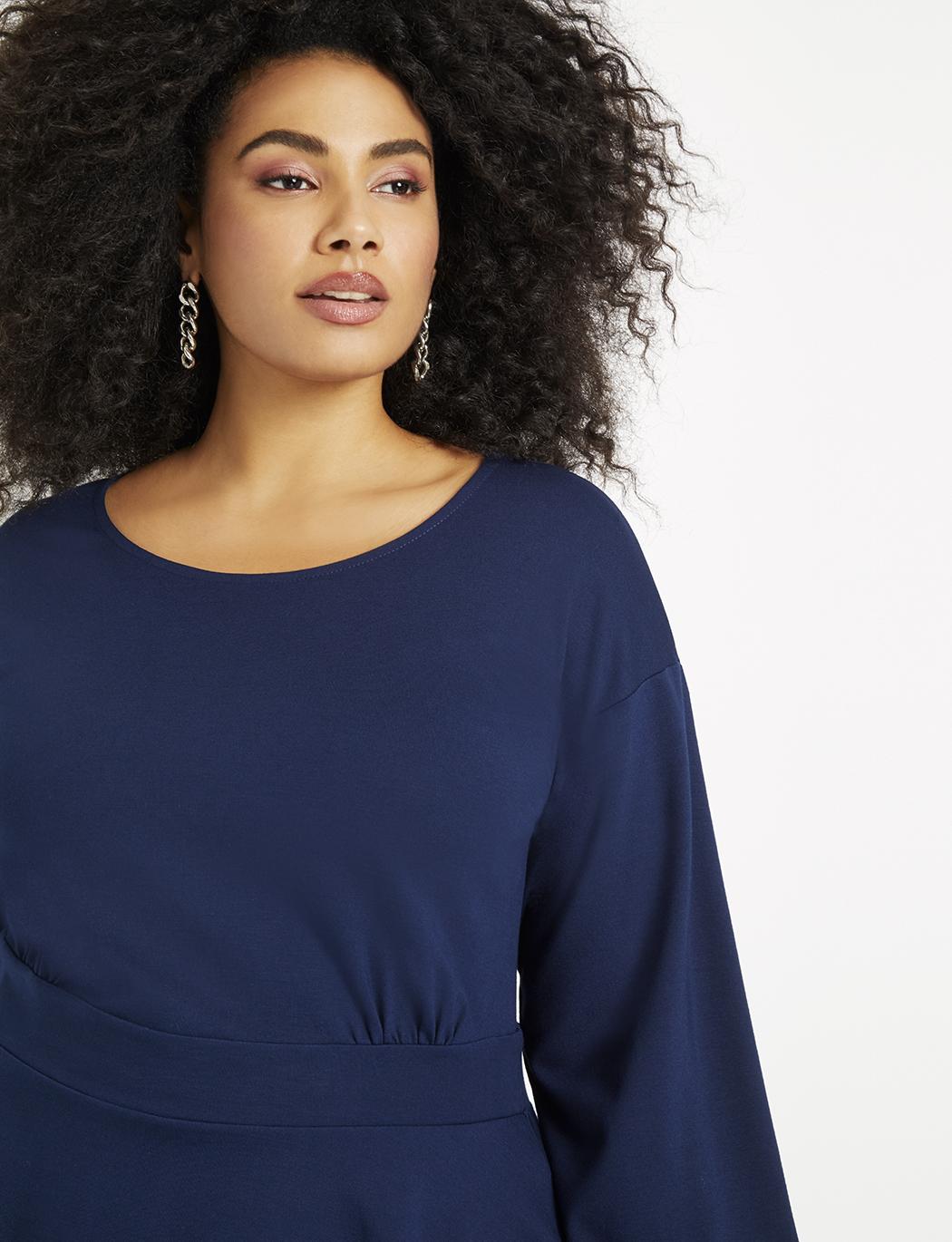 blue top with puff sleeves