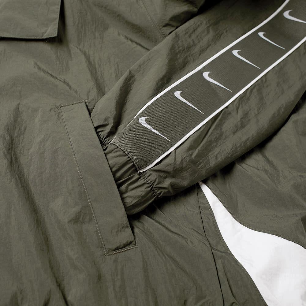 nike taped swoosh popover jacket