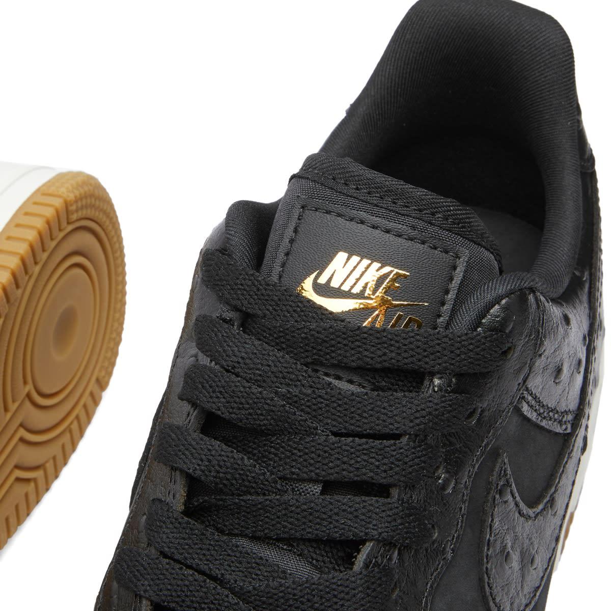 nike air force one black and gold