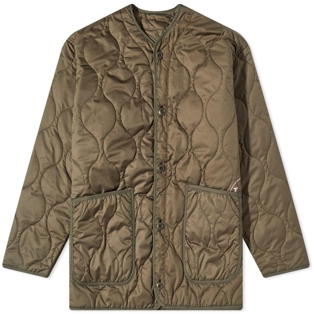 Water-repellent quilted down jacket in light wool with sailing patch