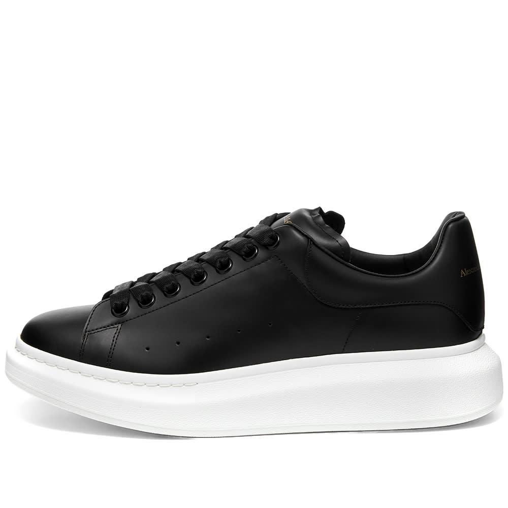 black wedge sneakers with black sole