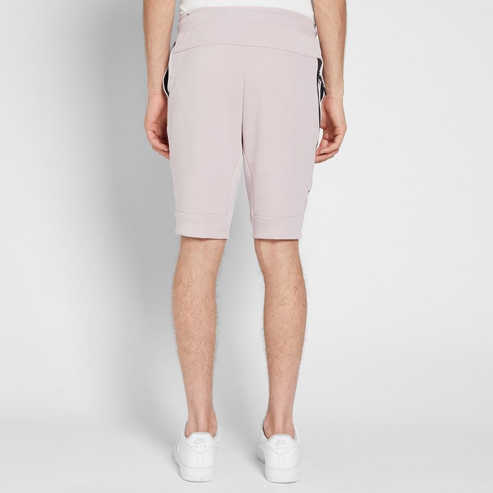 pink nike tech shorts