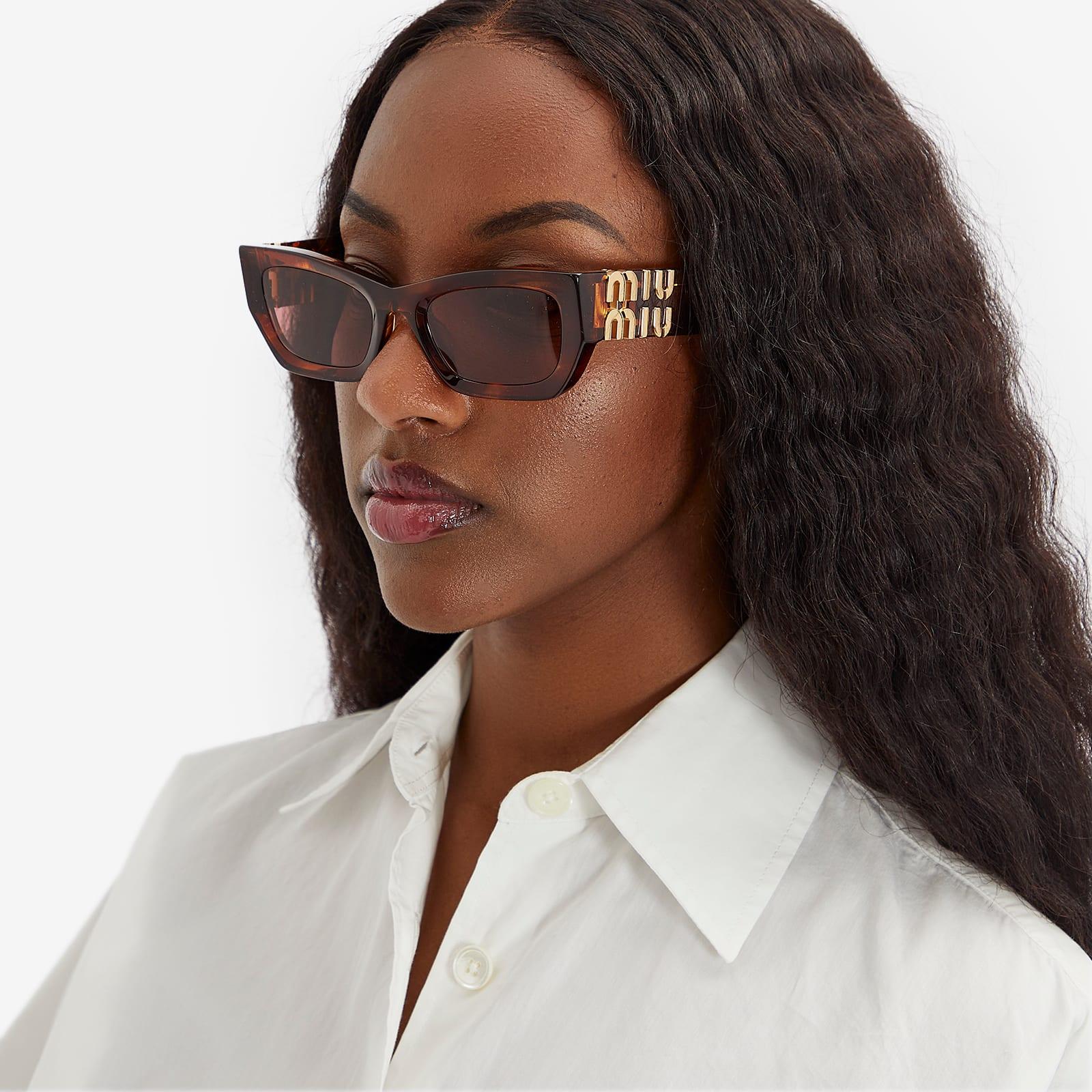 miu miu striped tobacco glasses MU 09WS Runway sunglasses 17 size with acetate front and metal temple materials Miu Miu Eyewear Women's 11WS