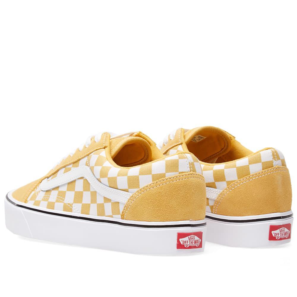 yellow checkerboard vans sneakers