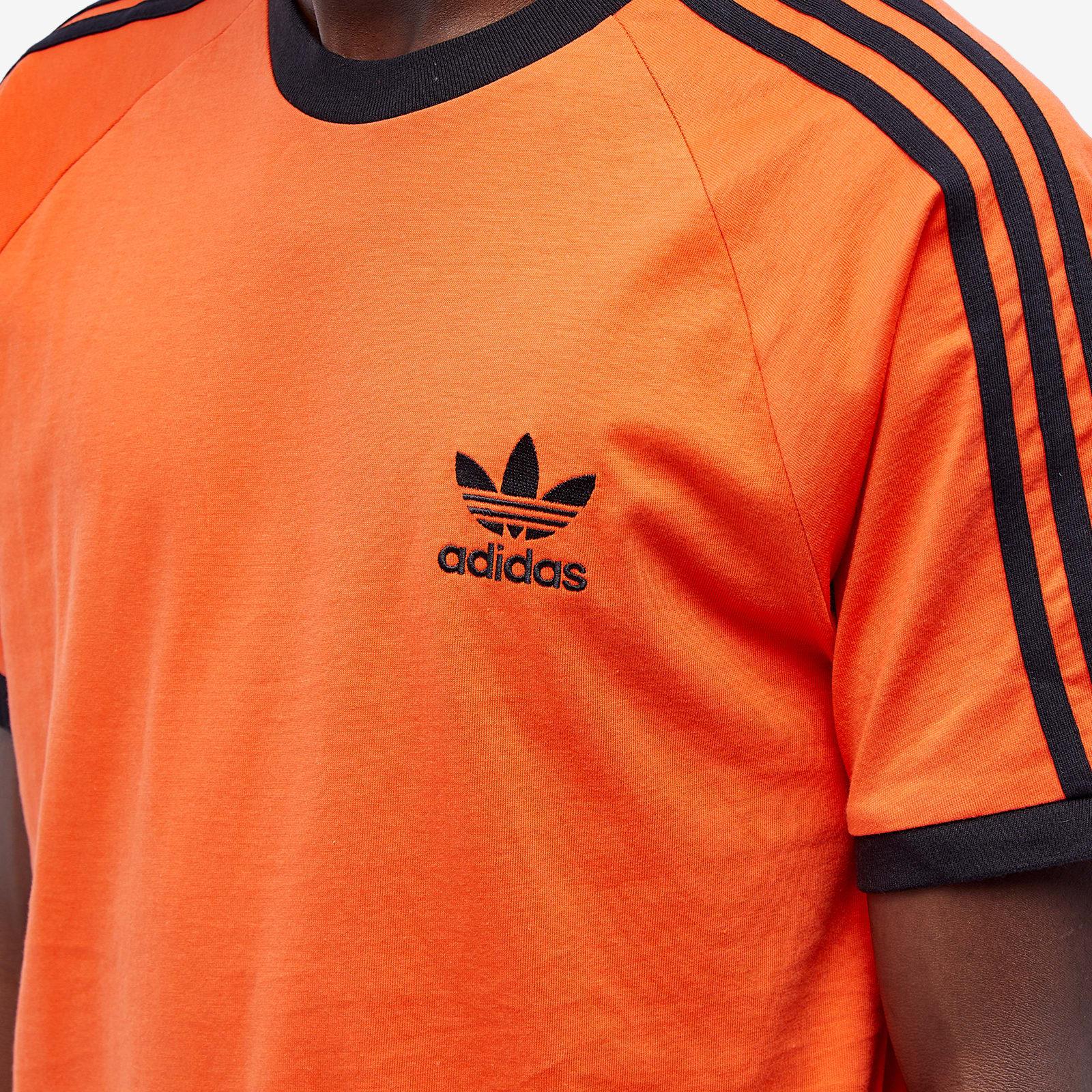 Black and orange adidas t shirt hotsell