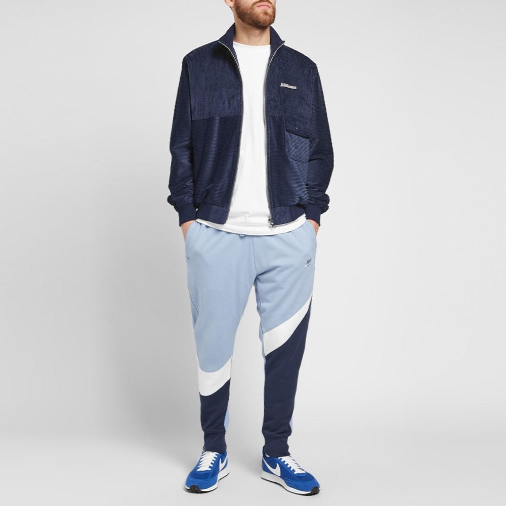 nike big swoosh joggers