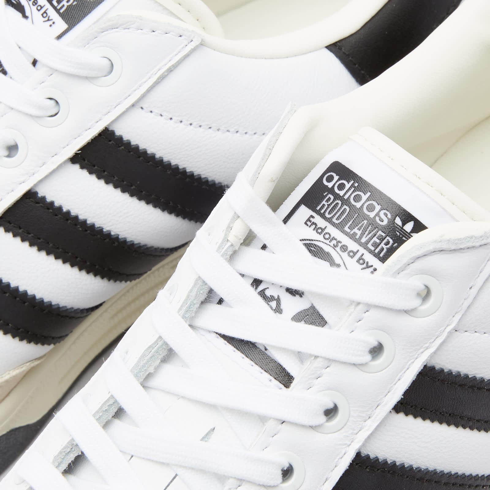 Adidas white with deals black stripes sneakers