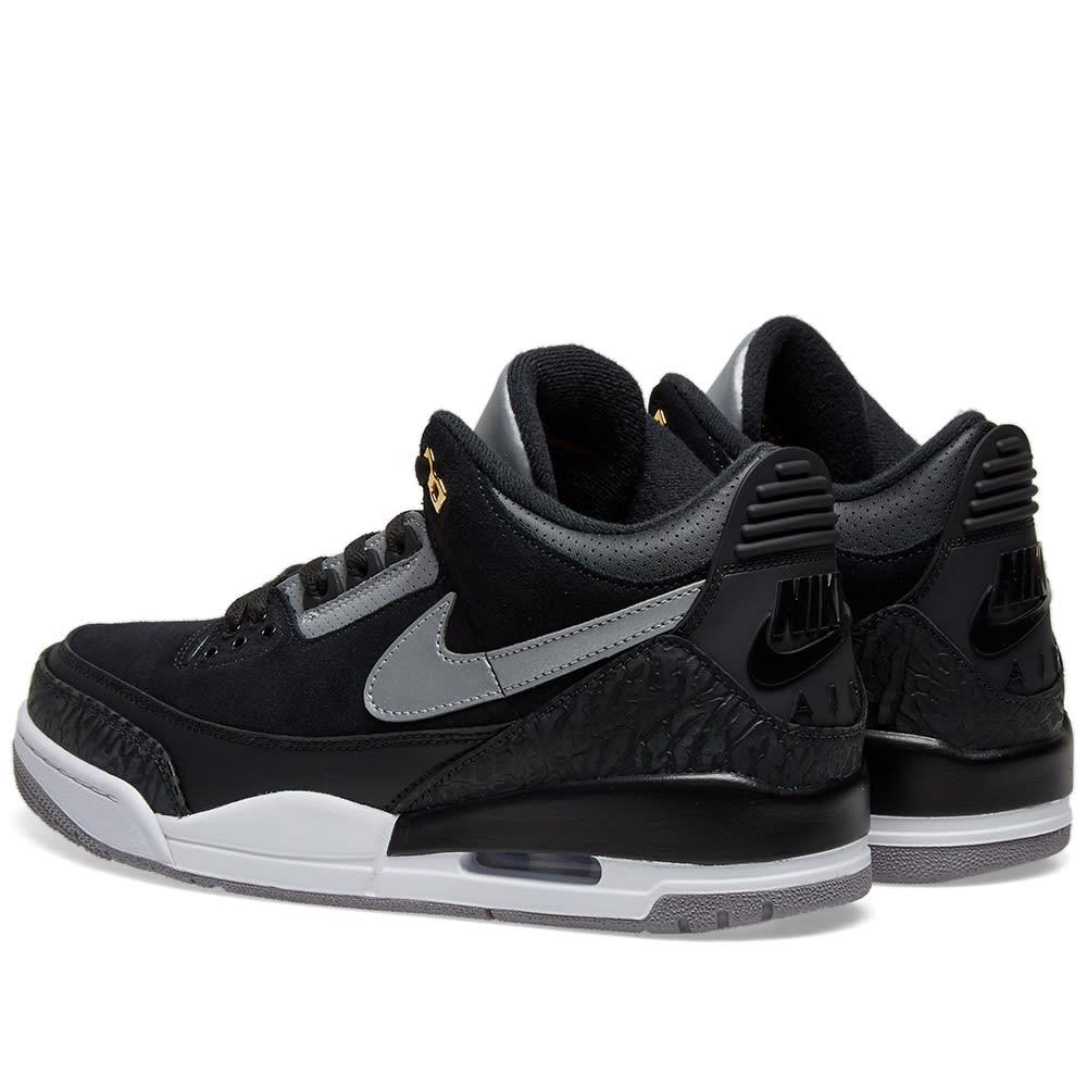 black and grey jordan 4s