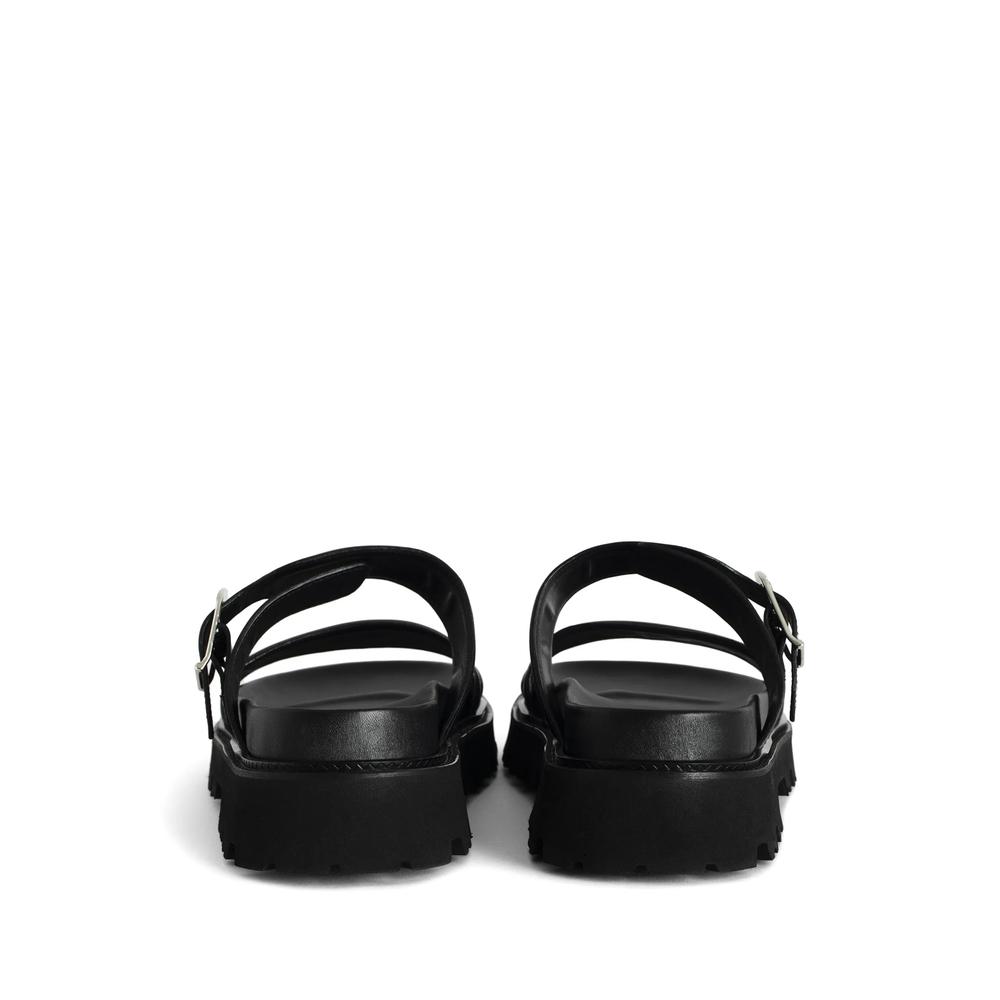 SANDALES ZADIG & VOLTAIRE – TAILLE 36 (US 5,5) – CUIR NOIR – PLATE – NEUVE AVEC DÉFAUTS MINEURS