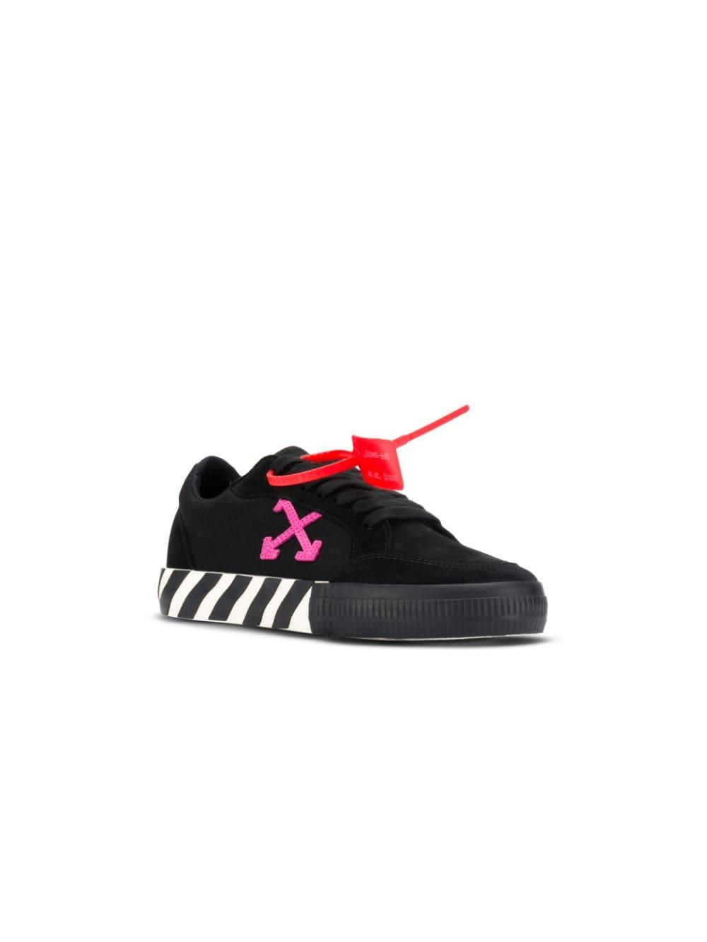 sneakers with arrow logo