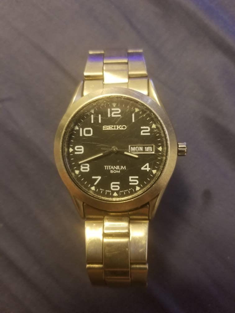 Etsy Vintage Seiko Titanium 50m #7n48-0ab0 Day/date Quartz Watch in  Metallic for Men - Lyst