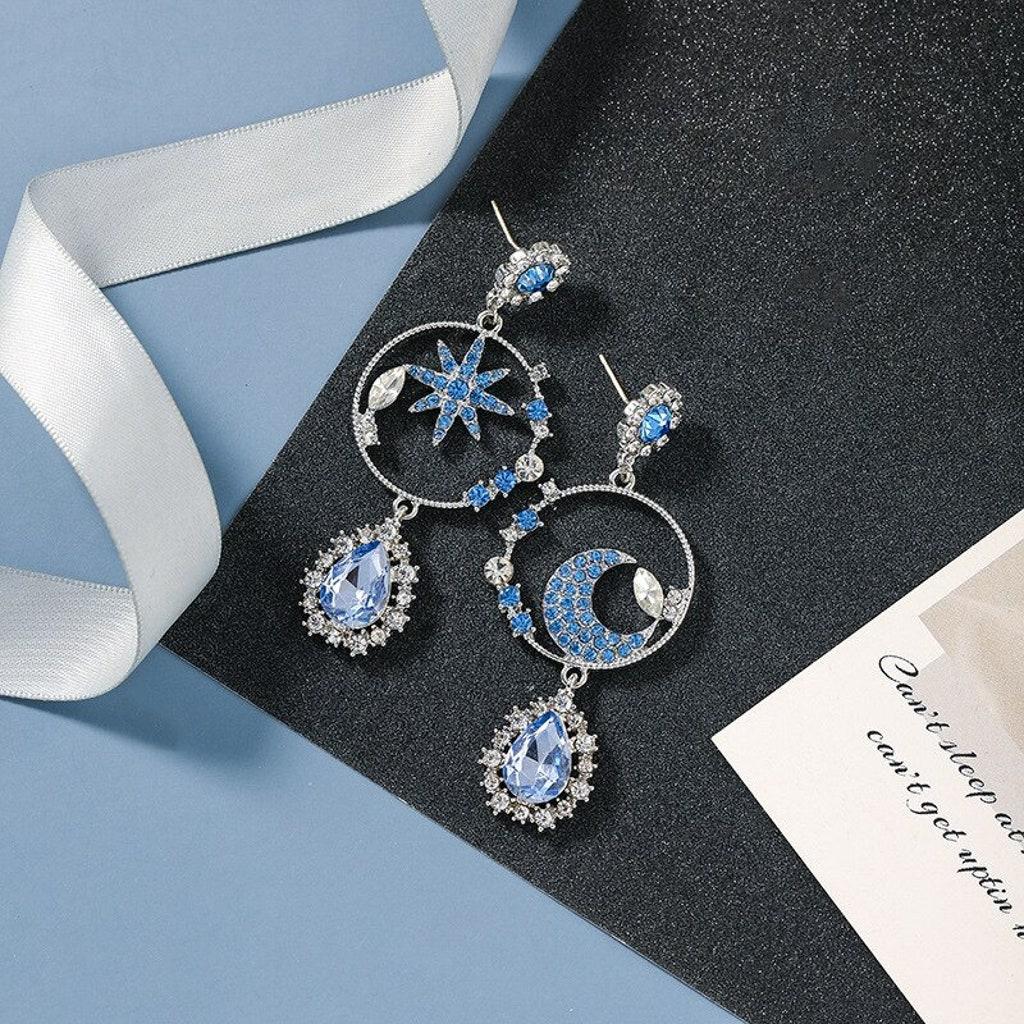 Blue Star/ bling  dangle earrings 
