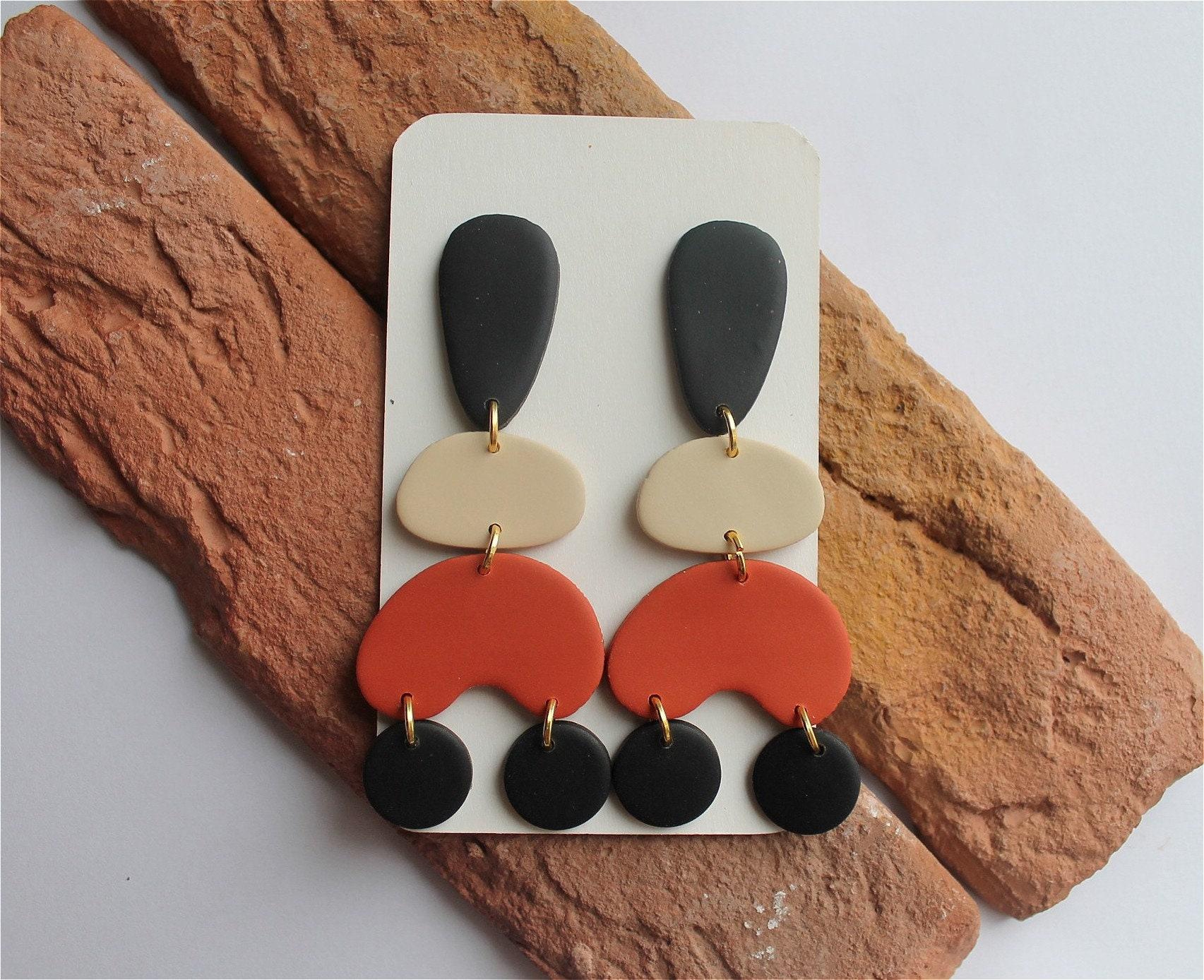 hook earrings in terra cotta Polymer clay statement earrings black and ivory