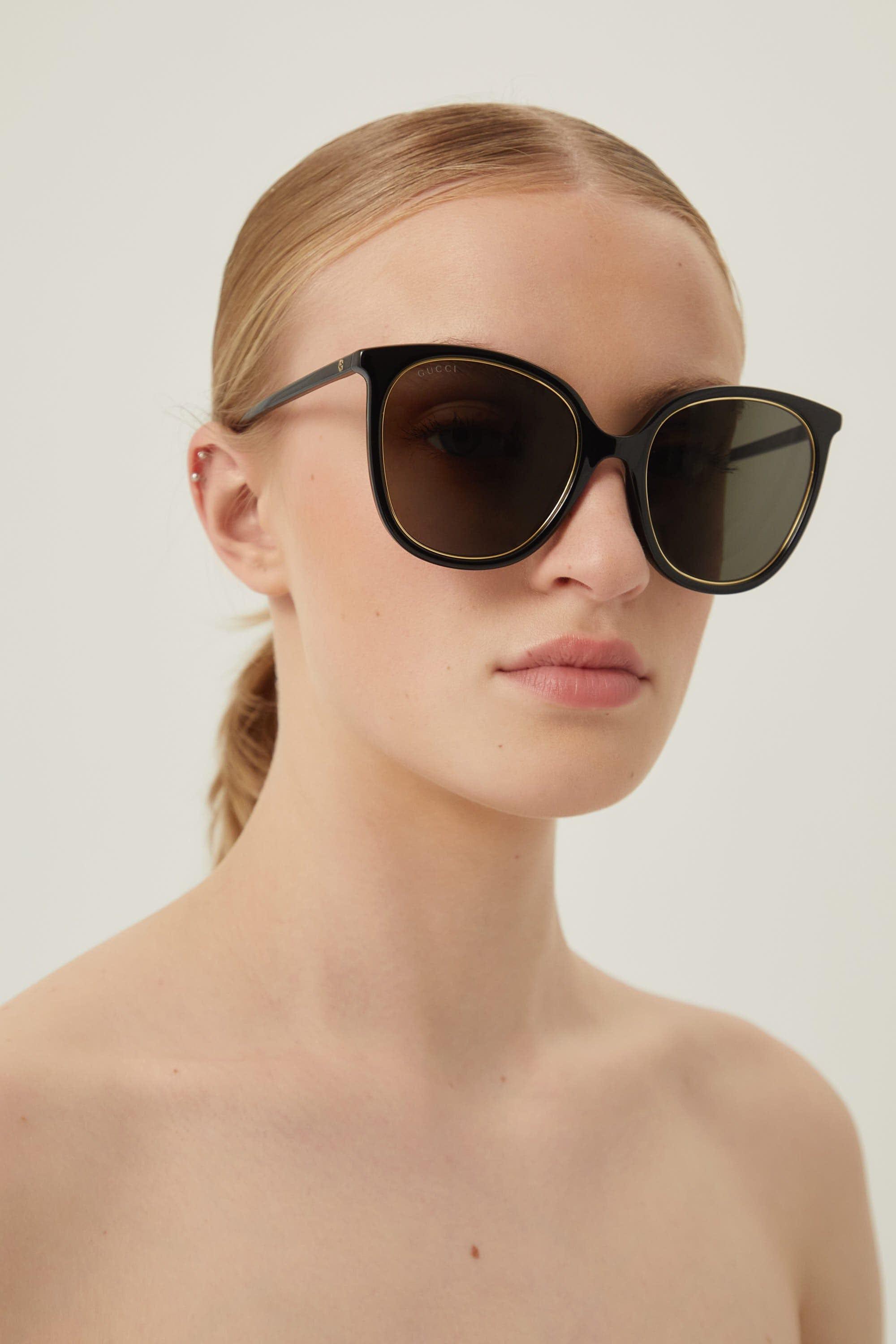 Gucci Black Cat-eye Sunglasses With Chain in Natural | Lyst
