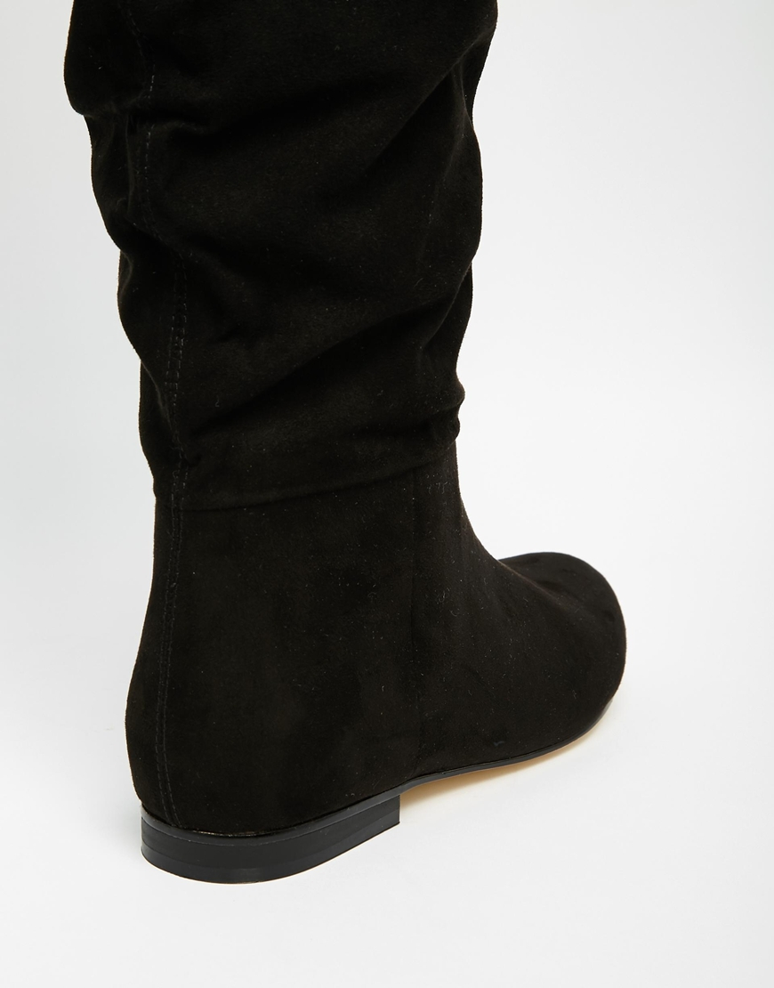 black slouch boots flat