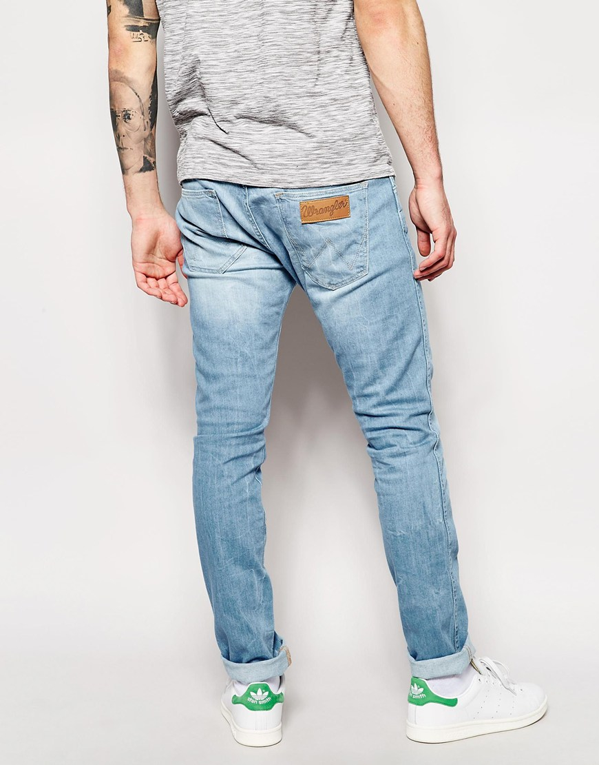Wrangler LEON LOOSE FLARE - Flared Jeans - rinse/dark-blue denim -  Zalando.de